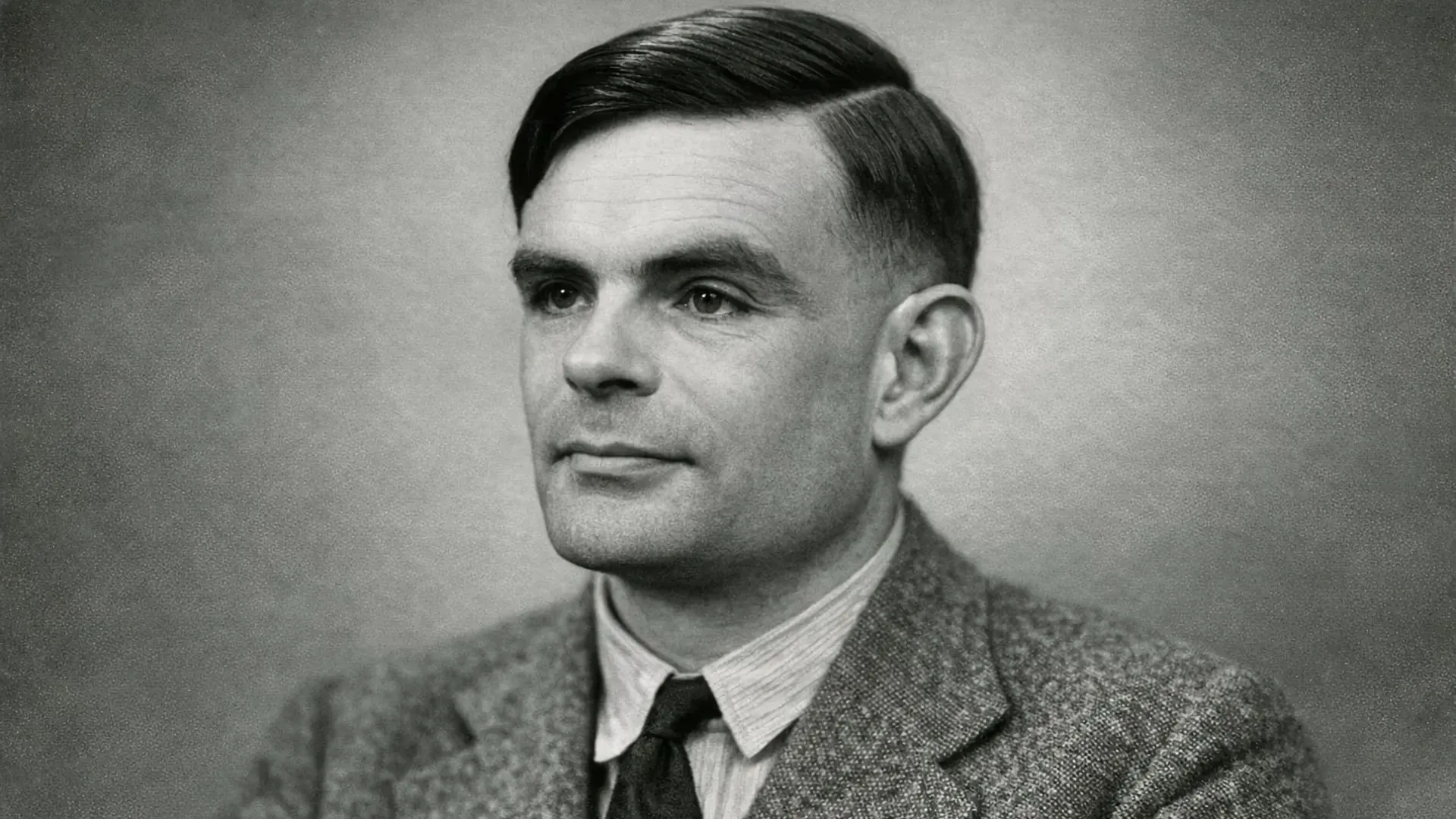 Black-and-white portrait of Alan Turing