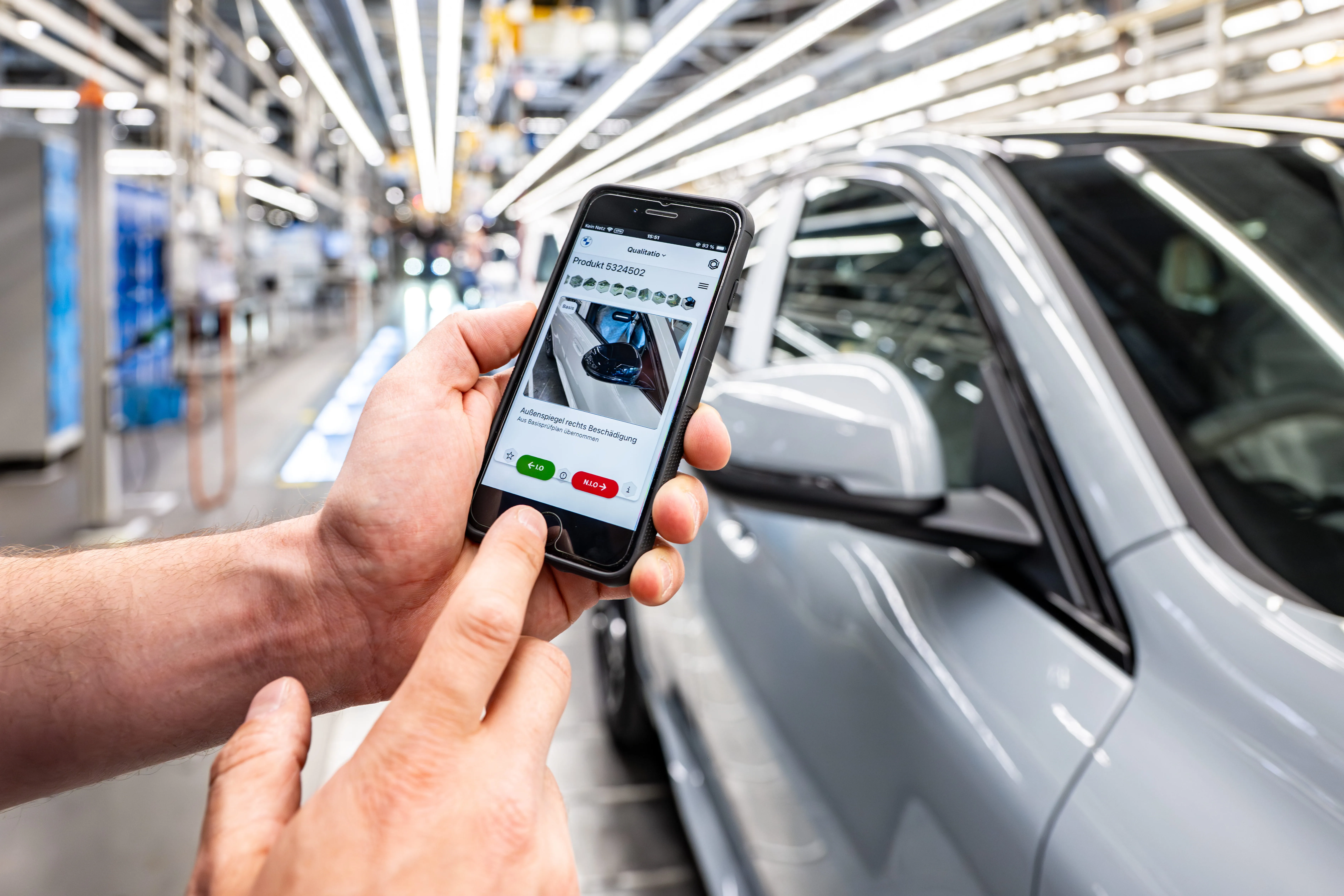 BMW production line where GenAI4Q recommends targeted quality inspections