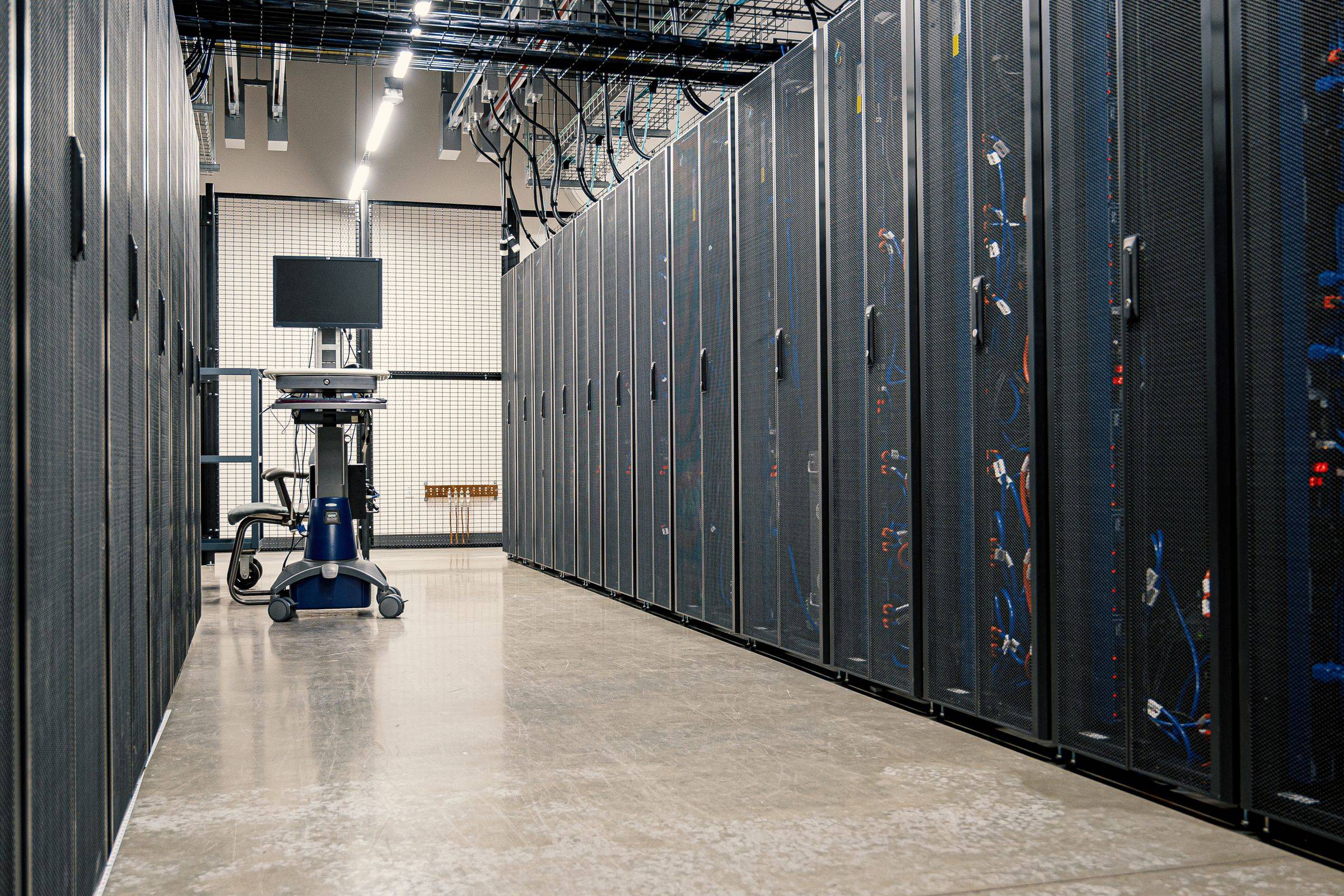 A data center corridor with rows of servers